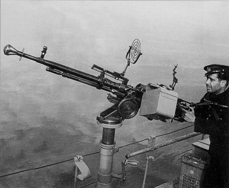 Боцман катера МО-501 главный старшина Н.М. Петросян у пулемёта ДШК. Май 1943 г.