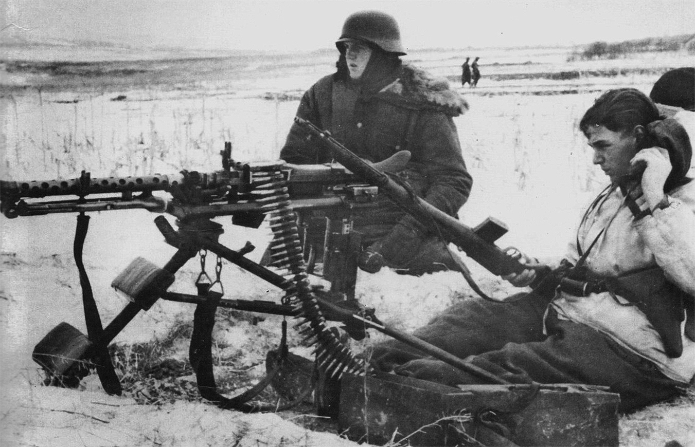 German  WW II   5 x 7 Inch  Photo  /</> Soldier Firing MG 34 Machine gun
