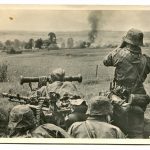 unsere_waffen_ss_post_card_in_battle_around_a_soviet_village.jpg