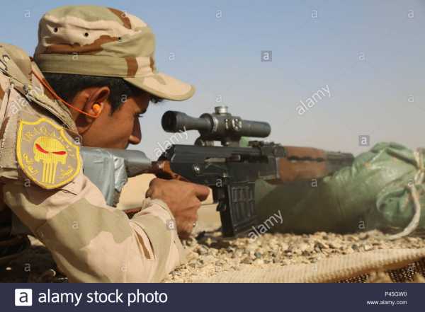 an iraqi soldier assigned to 29th brigade fires his svd dragunov sniper rifle during 200 to 600 meter fire repetition practice at al asad air base iraq june 15 201