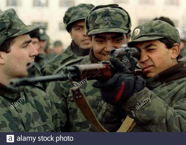 a bulgarian army soldier surrounded by his colleagues aims a russian made sniper rifle january 5 around 10000 recruits entered the bulgarian army ranks 