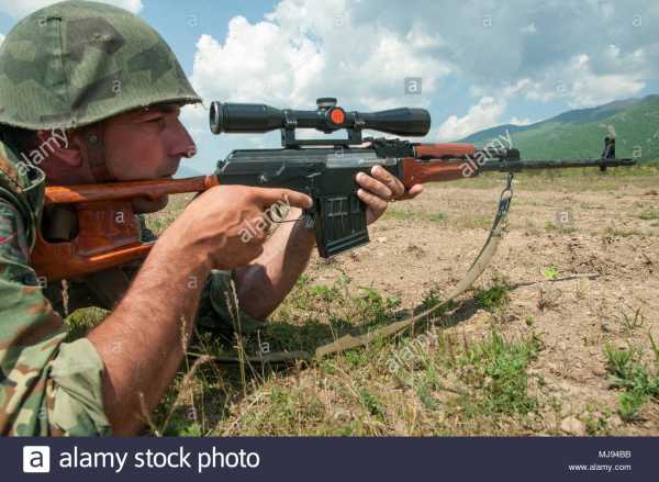 a bulgarian sniper assigned to 3rd mechanized company 1st battalion 61st mechanized brigade karlovo bulgaria looks down range through his rifle scope at anevo  (1)