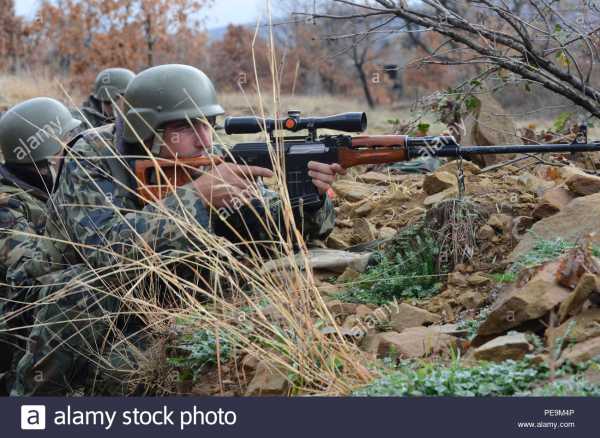 a bulgarian soldier of 1 61st mechanized battalion looks through the scope mounted on a dragunov sniper rifle toward the enemy during exercise peace sen