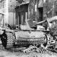 Немецкая САУ StuG. III, уничтоженная в ходе боя на городской улице Фото