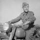 Водитель 3-го гв. мотоциклетного полка гв. ефрейтор Дмитрий Горохов на мотоцикле М-72 Фото